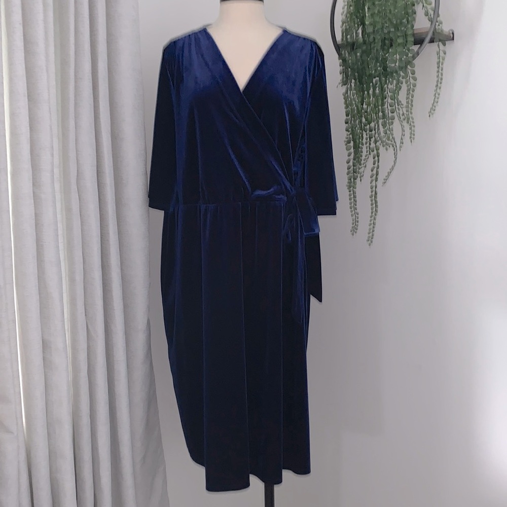 Woman’s blue faux wrap dress
